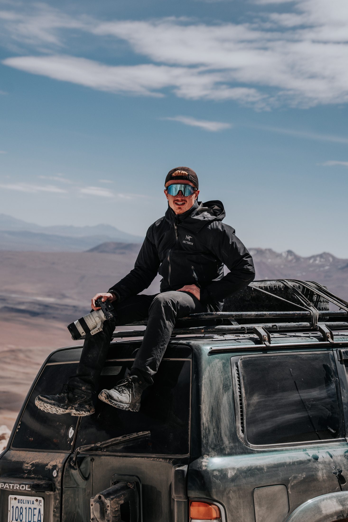 Me on a vehicle roof on the Bolivian altiplano